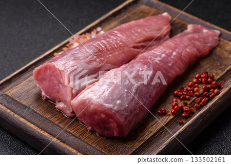 Raw pork tenderloin, fresh meat, a source of protein, and an ingredient for a meal. Pork tenderloin 133502161