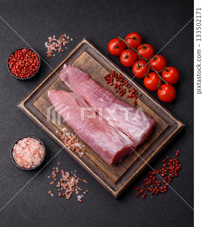 Raw pork tenderloin, fresh meat, a source of protein, and an ingredient for a meal. Pork tenderloin 133502171