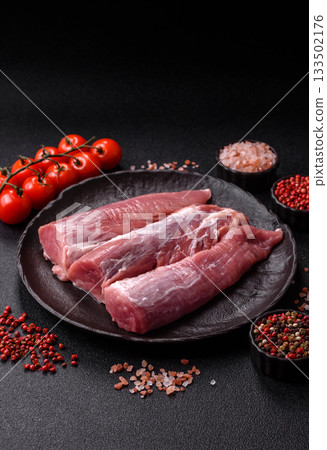 Raw pork tenderloin, fresh meat, a source of protein, and an ingredient for a meal. Pork tenderloin 133502176