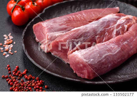 Raw pork tenderloin, fresh meat, a source of protein, and an ingredient for a meal. Pork tenderloin Raw pork tenderloin, fresh meat, a source of protein, and an ingredient for a meal. Pork tenderloin 133502177