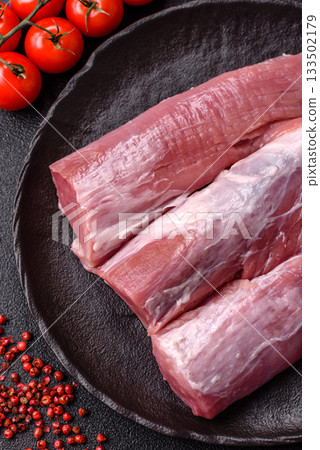 Raw pork tenderloin, fresh meat, a source of protein, and an ingredient for a meal. Pork tenderloin 133502179