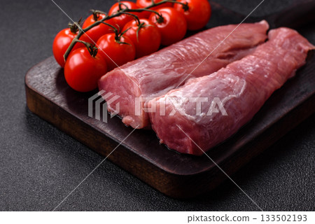 Raw pork tenderloin, fresh meat, a source of protein, and an ingredient for a meal. Pork tenderloin Raw pork tenderloin, fresh meat, a source of protein, and an ingredient for a meal. Pork tenderloin 133502193