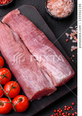 Raw pork tenderloin, fresh meat, a source of protein, and an ingredient for a meal. Pork tenderloin Raw pork tenderloin, fresh meat, a source of protein, and an ingredient for a meal. Pork tenderloin 133502198