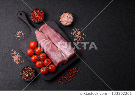 Raw pork tenderloin, fresh meat, a source of protein, and an ingredient for a meal. Pork tenderloin Raw pork tenderloin, fresh meat, a source of protein, and an ingredient for a meal. Pork tenderloin 133502201
