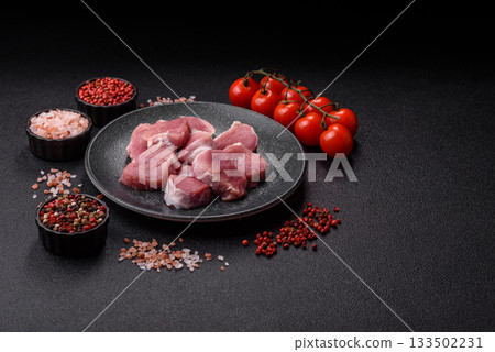 Raw pork tenderloin, sliced, is fresh meat, a source of protein. Pork tenderloin Raw pork tenderloin, sliced, is fresh meat, a source of protein. Pork tenderloin 133502231