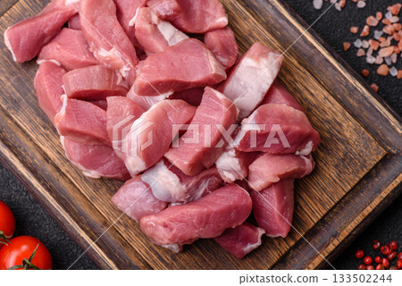 Raw pork, sliced, fresh meat, a source of protein, and an ingredient for a hearty meal. Raw pork 133502244