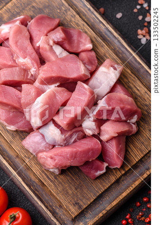 Raw pork, sliced, fresh meat, a source of protein, and an ingredient for a hearty meal. Raw pork Raw pork, sliced, fresh meat, a source of protein, and an ingredient for a hearty meal. Raw pork 133502245