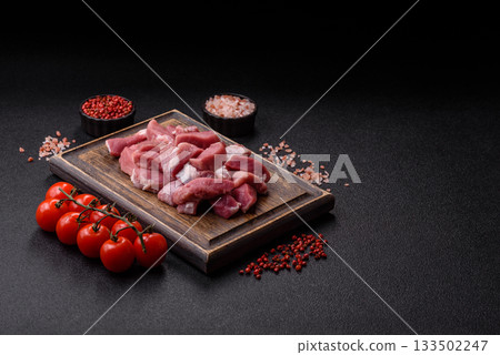 Raw pork, sliced, fresh meat, a source of protein, and an ingredient for a hearty meal. Raw pork Raw pork, sliced, fresh meat, a source of protein, and an ingredient for a hearty meal. Raw pork 133502247
