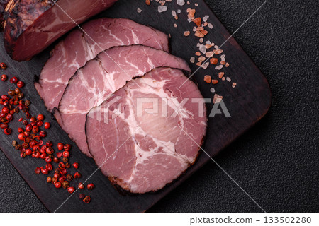 Ham, a meat cooked and sliced for sandwiches or Christmas table. Ham slices Ham, a meat cooked and sliced for sandwiches or Christmas table. Ham slices 133502280
