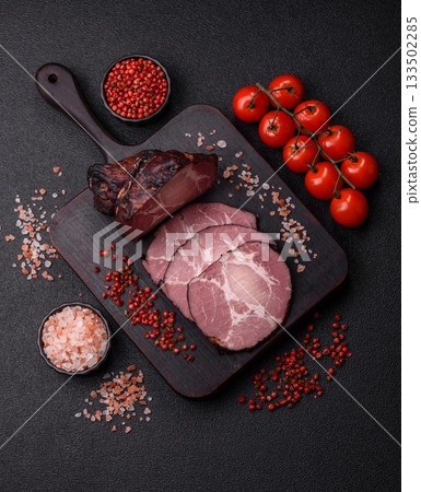 Ham, a meat cooked and sliced for sandwiches or Christmas table. Ham slices Ham, a meat cooked and sliced for sandwiches or Christmas table. Ham slices 133502285