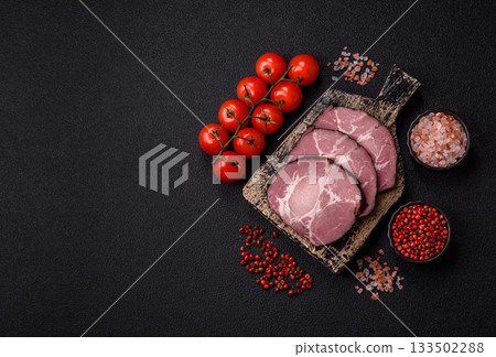 Ham, a meat cooked and sliced for sandwiches or Christmas table. Ham slices 133502288