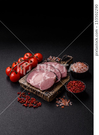 Ham, a meat cooked and sliced for sandwiches or Christmas table. Ham slices 133502290