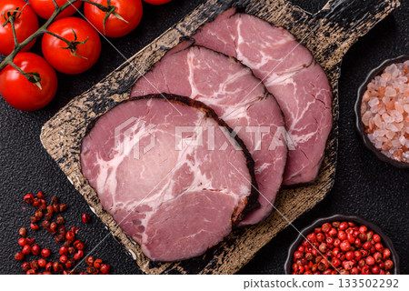 Ham, a meat cooked and sliced for sandwiches or Christmas table. Ham slices 133502292