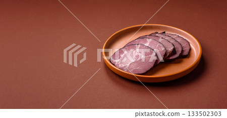 Ham, a meat cooked and sliced for sandwiches or Christmas table. Ham slices Ham, a meat cooked and sliced for sandwiches or Christmas table. Ham slices 133502303