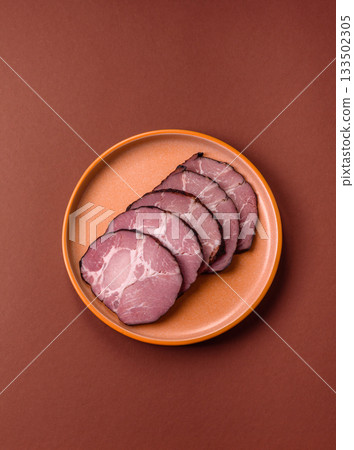 Ham, a meat cooked and sliced for sandwiches or Christmas table. Ham slices 133502305