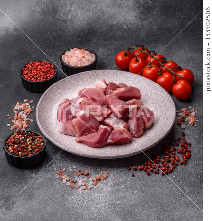 Raw pork, sliced, fresh meat, a source of protein, and an ingredient for a hearty meal. Raw pork 133502506