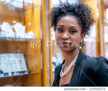 Woman in jewelry, smiling 133502575