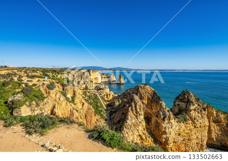Ponta da Piedade is a unique rock formation with famous grottos in the ocean at Lagos, Algrave, Portugal 133502663