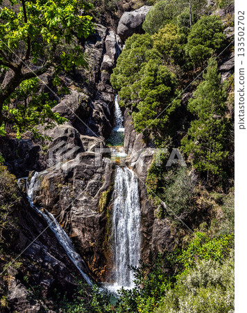 The beautiful Arado Waterfall, Cascata do Arado at the Peneda Geres National Park in Portugal, Europe The beautiful Arado Waterfall, Cascata do Arado at the Peneda Geres National Park in Portugal, Europe 133502702