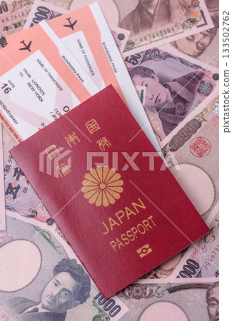 Japanese passport or id document with tickets for flight, travel, border crossing. Japan passport Japanese passport or id document with tickets for flight, travel, border crossing. Japan passport 133502762