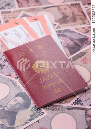 Japanese passport or id document with tickets for flight, travel, border crossing. Japan passport Japanese passport or id document with tickets for flight, travel, border crossing. Japan passport 133502763