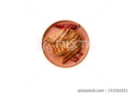 Grilled chicken or turkey breast, a healthy lunch option. Grilled chicken steak Grilled chicken or turkey breast, a healthy lunch option. Grilled chicken steak 133502851