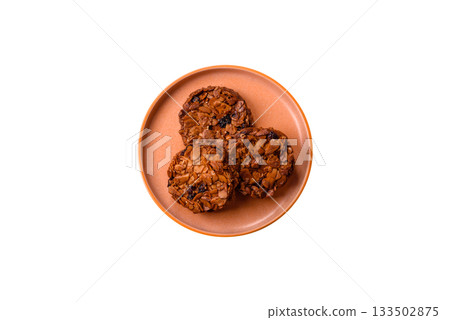 Chocolate chip cookies with caramelized nuts, a healthy sweet snack. Nut cookies Chocolate chip cookies with caramelized nuts, a healthy sweet snack. Nut cookies 133502875