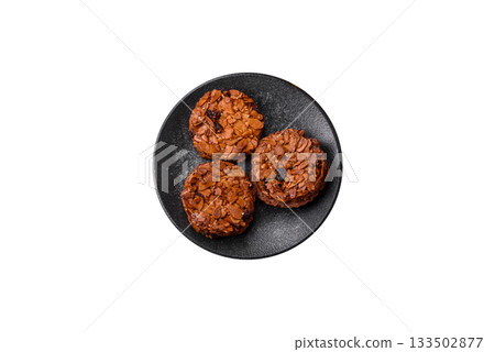 Chocolate chip cookies with caramelized nuts, a healthy sweet snack. Nut cookies Chocolate chip cookies with caramelized nuts, a healthy sweet snack. Nut cookies 133502877