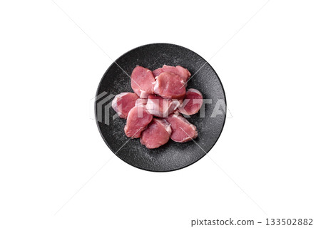 Raw pork tenderloin, sliced, is fresh meat, a source of protein. Pork tenderloin Raw pork tenderloin, sliced, is fresh meat, a source of protein. Pork tenderloin 133502882