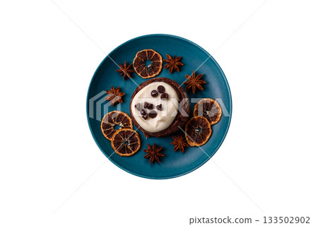 Cinnamon roll, a sweet bun with citrus, cherries, and chocolate, a Danish dessert with cream Cinnamon roll, a sweet bun with citrus, cherries, and chocolate, a Danish dessert with cream 133502902