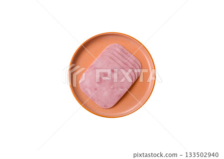 Meat, square ham sliced, organic food, protein for snacks. Sliced ham as a background Meat, square ham sliced, organic food, protein for snacks. Sliced ham as a background 133502940