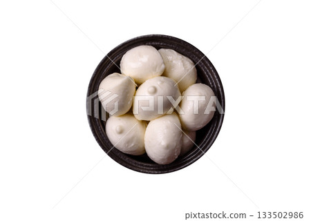 Mozzarella cheese balls, fresh white mini slices for Mediterranean food. Mozzarella cheese 133502986
