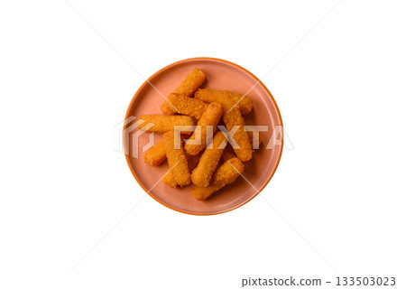Mozzarella cheese sticks, crispy nutritious fast food. Cheese sticks as food background 133503023