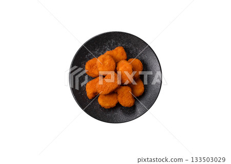 Chicken nugget with sauce, crispy nutritious fast food. Chicken nugget Chicken nugget with sauce, crispy nutritious fast food. Chicken nugget 133503029