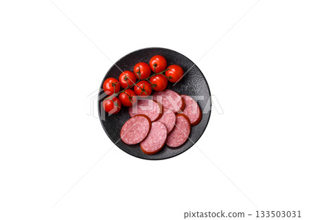 Sliced salami sausage, smoked dry meat as food background. Sliced salami Sliced salami sausage, smoked dry meat as food background. Sliced salami 133503031