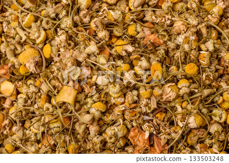 Dried chamomile flowers, herbal tea in a bowl for a hot morning drink. Dried chamomile Dried chamomile flowers, herbal tea in a bowl for a hot morning drink. Dried chamomile 133503248