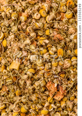 Dried chamomile flowers, herbal tea in a bowl for a hot morning drink. Dried chamomile Dried chamomile flowers, herbal tea in a bowl for a hot morning drink. Dried chamomile 133503249