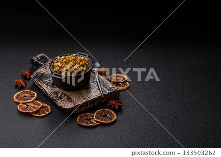 Dried chamomile flowers, herbal tea in a bowl for a hot morning drink. Dried chamomile Dried chamomile flowers, herbal tea in a bowl for a hot morning drink. Dried chamomile 133503262