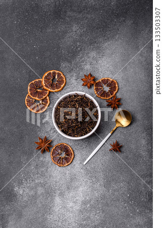 Golden black tea, dried leaves of a Chinese or Indian breakfast drink. Black tea dried leaves Golden black tea, dried leaves of a Chinese or Indian breakfast drink. Black tea dried leaves 133503307