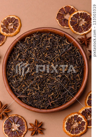 Golden black tea, dried leaves of a Chinese or Indian breakfast drink. Black tea dried leaves 133503319
