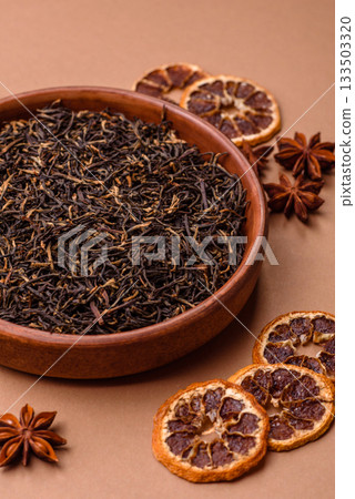 Golden black tea, dried leaves of a Chinese or Indian breakfast drink. Black tea dried leaves 133503320