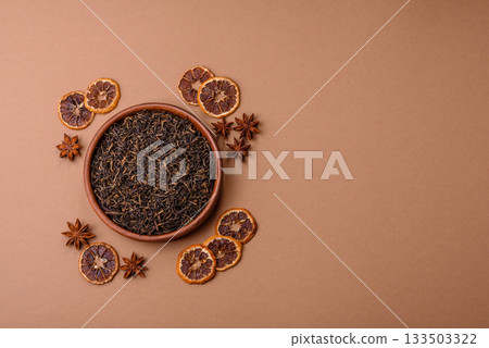 Golden black tea, dried leaves of a Chinese or Indian breakfast drink. Black tea dried leaves Golden black tea, dried leaves of a Chinese or Indian breakfast drink. Black tea dried leaves 133503322