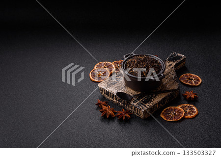 Golden black tea, dried leaves of a Chinese or Indian breakfast drink. Black tea dried leaves 133503327
