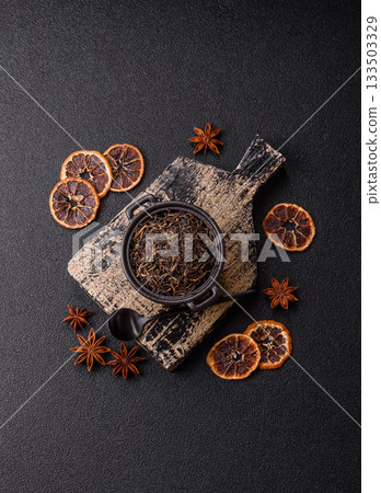 Golden black tea, dried leaves of a Chinese or Indian breakfast drink. Black tea dried leaves 133503329