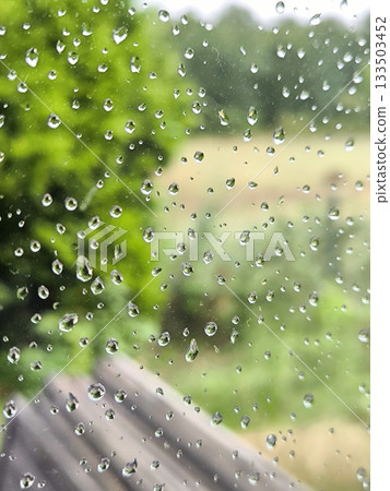Raindrops on the window glass 133503452