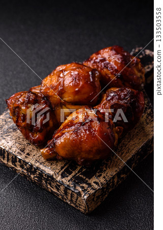 Fried chicken legs with teriyaki sauce, oven baked meat. Chicken legs Fried chicken legs with teriyaki sauce, oven baked meat. Chicken legs 133503558