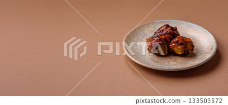 Fried chicken legs with teriyaki sauce, oven baked meat. Chicken legs 133503572