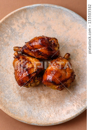 Fried chicken legs with teriyaki sauce, oven baked meat. Chicken legs Fried chicken legs with teriyaki sauce, oven baked meat. Chicken legs 133503582
