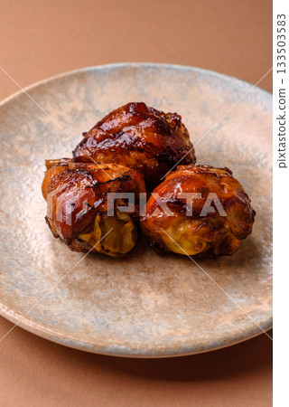 Fried chicken legs with teriyaki sauce, oven baked meat. Chicken legs 133503583