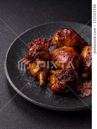 Fried chicken legs with teriyaki sauce, oven baked meat. Chicken legs 133503598
